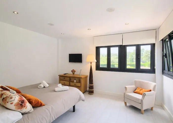 Llanes Piscina Interior Y Exterior - Talima